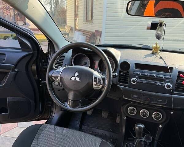 Чорний Міцубісі Lancer, об'ємом двигуна 2 л та пробігом 150 тис. км за 6500 $, фото 1 на Automoto.ua