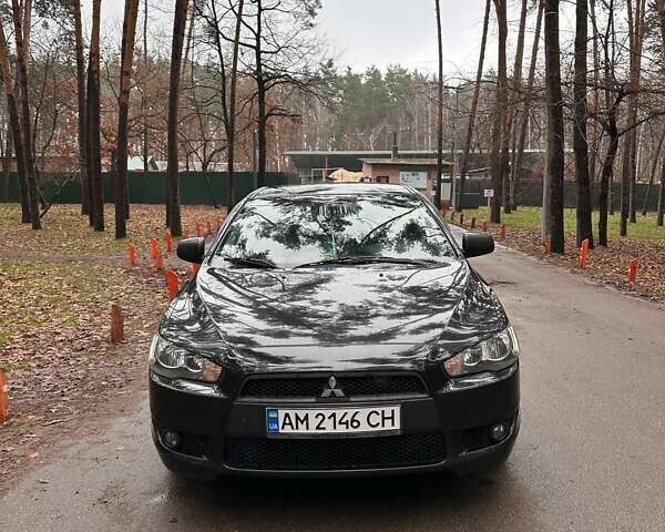 Чорний Міцубісі Lancer, об'ємом двигуна 2 л та пробігом 263 тис. км за 5750 $, фото 1 на Automoto.ua