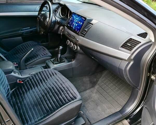 Черный Мицубиси Лансер, объемом двигателя 1.8 л и пробегом 172 тыс. км за 7100 $, фото 24 на Automoto.ua