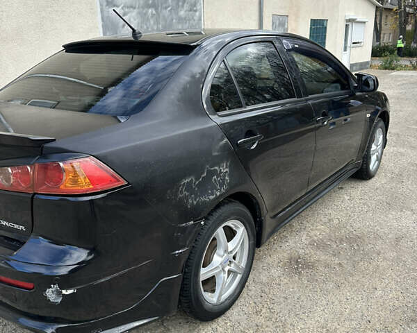 Мицубиси Лансер 2008 в Кодыме на Automoto.ua Черный Мицубиси Лансер, объемом двигателя 1.5 л и пробегом 170 тыс. км за 3300 $, фото 1 на Automoto.ua