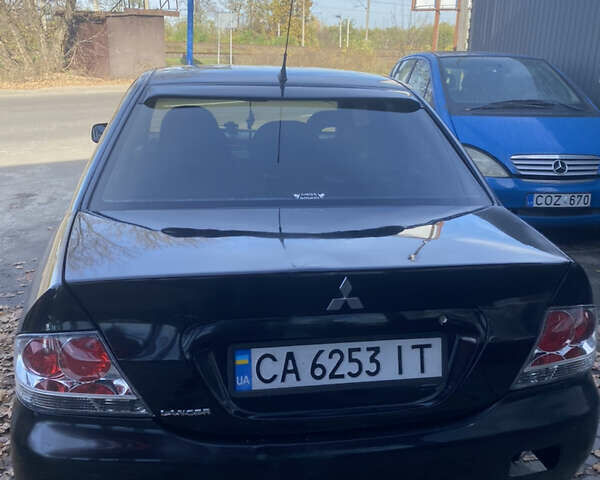 Мицубиси Лансер 2008 в Киеве на Automoto.ua Черный Мицубиси Лансер, объемом двигателя 1.6 л и пробегом 72 тыс. км за 2650 $, фото 2 на Automoto.ua