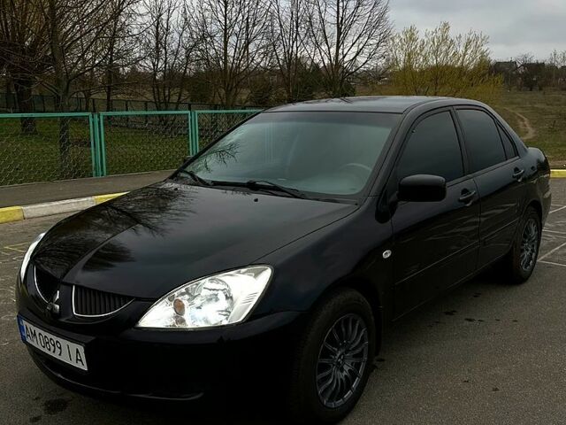 Чорний Міцубісі Lancer, об'ємом двигуна 1.6 л та пробігом 380 тис. км за 4350 $, фото 2 на Automoto.ua