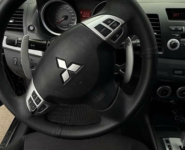 Черный Мицубиси Лансер, объемом двигателя 2 л и пробегом 222 тыс. км за 6000 $, фото 12 на Automoto.ua