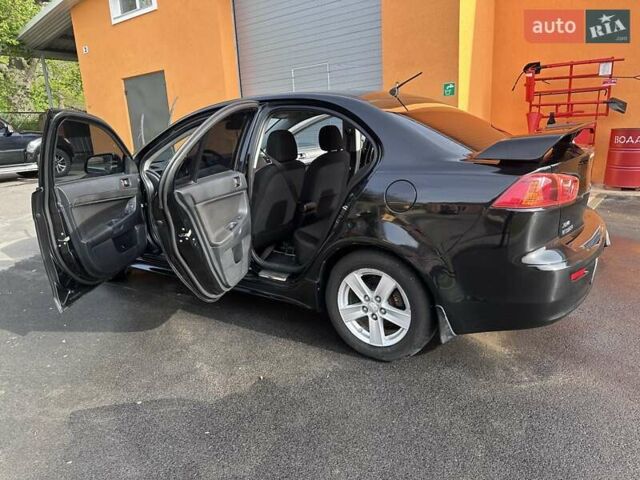 Чорний Міцубісі Lancer, об'ємом двигуна 2 л та пробігом 360 тис. км за 6900 $, фото 1 на Automoto.ua