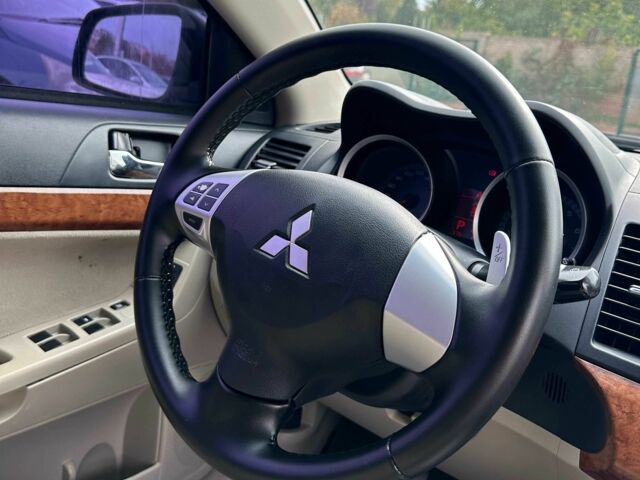 Чорний Міцубісі Lancer, об'ємом двигуна 2 л та пробігом 239 тис. км за 6900 $, фото 11 на Automoto.ua