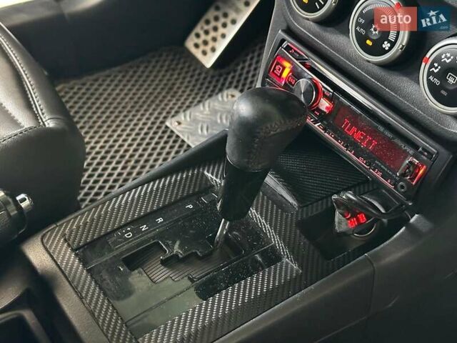 Чорний Міцубісі Lancer, об'ємом двигуна 2 л та пробігом 313 тис. км за 7690 $, фото 23 на Automoto.ua