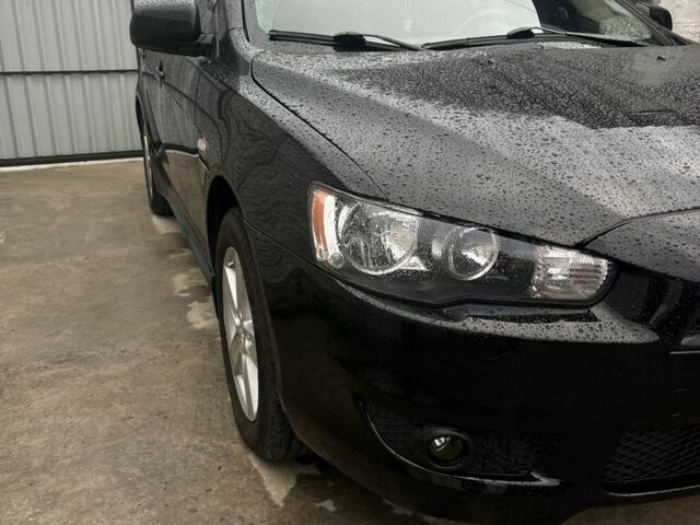 Чорний Міцубісі Lancer, об'ємом двигуна 2 л та пробігом 219 тис. км за 6800 $, фото 3 на Automoto.ua