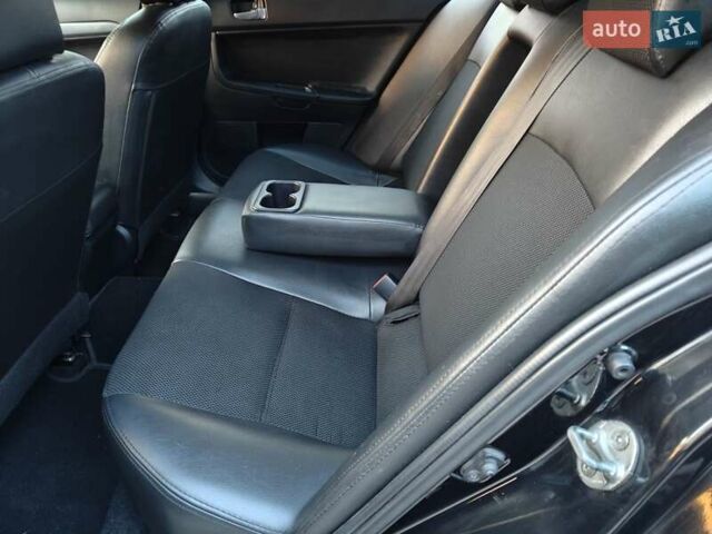 Черный Мицубиси Лансер, объемом двигателя 2 л и пробегом 245 тыс. км за 5600 $, фото 8 на Automoto.ua