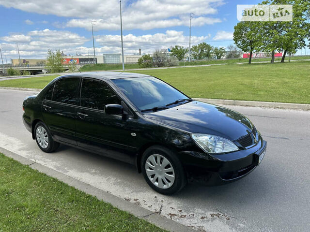 Чорний Міцубісі Lancer, об'ємом двигуна 1.6 л та пробігом 103 тис. км за 4300 $, фото 6 на Automoto.ua