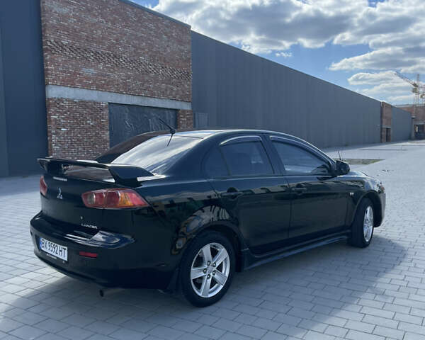 Чорний Міцубісі Lancer, об'ємом двигуна 2 л та пробігом 178 тис. км за 7150 $, фото 9 на Automoto.ua