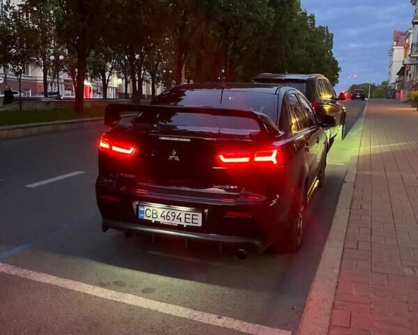 Мицубиси Лансер 2008 в Чернигове на Automoto.ua Черный Мицубиси Лансер, объемом двигателя 2 л и пробегом 254 тыс. км за 7500 $, фото 8 на Automoto.ua