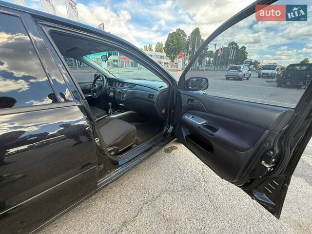 Чорний Міцубісі Lancer, об'ємом двигуна 1.6 л та пробігом 292 тис. км за 3600 $, фото 10 на Automoto.ua