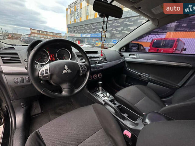 Черный Мицубиси Лансер, объемом двигателя 2 л и пробегом 236 тыс. км за 7950 $, фото 7 на Automoto.ua
