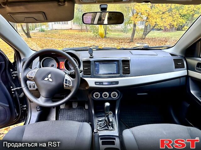 Чорний Міцубісі Lancer, об'ємом двигуна 2 л та пробігом 245 тис. км за 5500 $, фото 9 на Automoto.ua