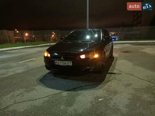 Черный Мицубиси Лансер, объемом двигателя 2 л и пробегом 240 тыс. км за 6400 $, фото 19 на Automoto.ua