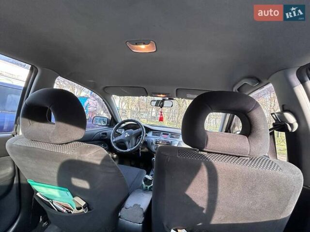 Чорний Міцубісі Lancer, об'ємом двигуна 1.6 л та пробігом 310 тис. км за 3500 $, фото 44 на Automoto.ua