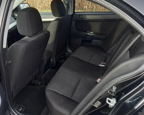 Чорний Міцубісі Lancer, об'ємом двигуна 1.5 л та пробігом 160 тис. км за 5850 $, фото 11 на Automoto.ua