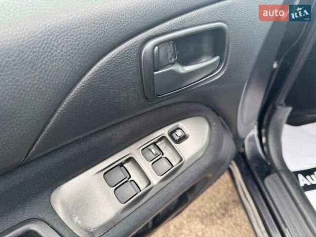 Мицубиси Лансер 2008 в Запорожье на Automoto.ua Черный Мицубиси Лансер, объемом двигателя 1.6 л и пробегом 316 тыс. км за 4290 $, фото 14 на Automoto.ua