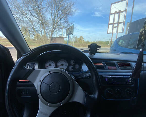 Мицубиси Лансер 2008 в Киеве на Automoto.ua Черный Мицубиси Лансер, объемом двигателя 1.6 л и пробегом 72 тыс. км за 2650 $, фото 7 на Automoto.ua