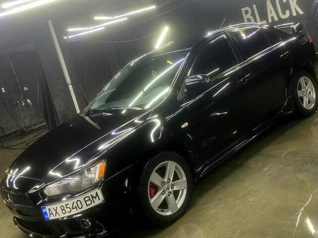 Чорний Міцубісі Lancer, об'ємом двигуна 2 л та пробігом 126 тис. км за 5800 $, фото 2 на Automoto.ua