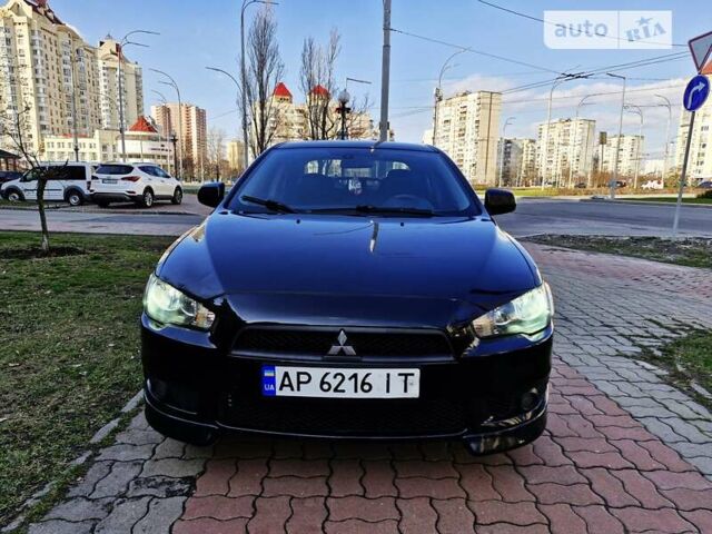 Чорний Міцубісі Lancer, об'ємом двигуна 2 л та пробігом 182 тис. км за 7650 $, фото 1 на Automoto.ua