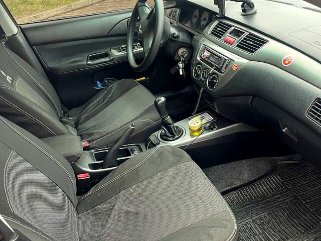 Чорний Міцубісі Lancer, об'ємом двигуна 16 л та пробігом 250 тис. км за 4500 $, фото 8 на Automoto.ua
