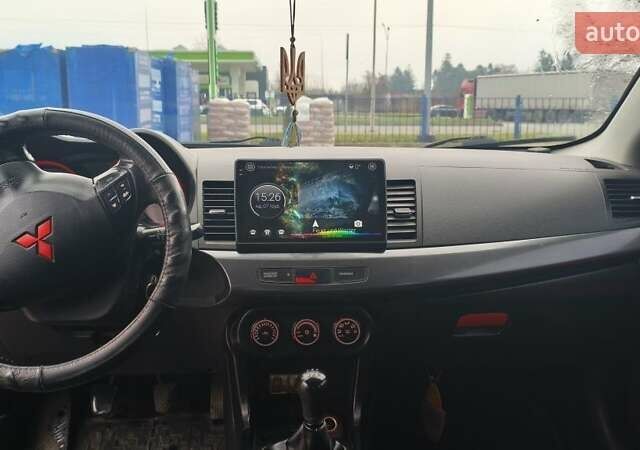 Чорний Міцубісі Lancer, об'ємом двигуна 2 л та пробігом 160 тис. км за 8000 $, фото 7 на Automoto.ua