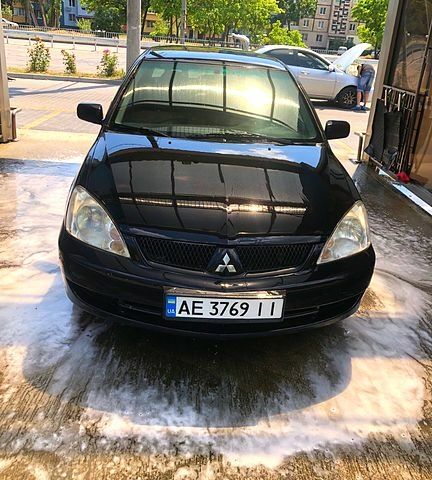 Чорний Міцубісі Lancer, об'ємом двигуна 1.6 л та пробігом 245 тис. км за 3200 $, фото 4 на Automoto.ua