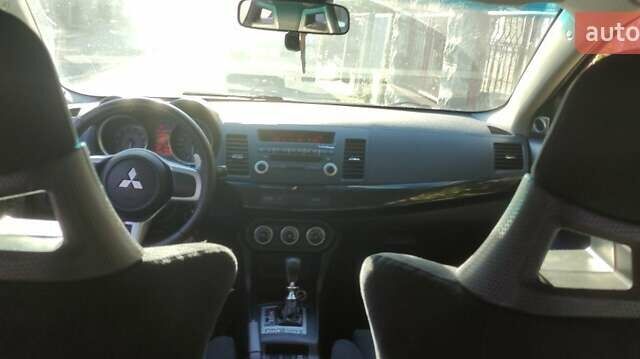 Чорний Міцубісі Lancer, об'ємом двигуна 2 л та пробігом 134 тис. км за 29034 $, фото 8 на Automoto.ua