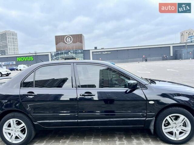 Чорний Міцубісі Lancer, об'ємом двигуна 1.6 л та пробігом 300 тис. км за 5500 $, фото 8 на Automoto.ua