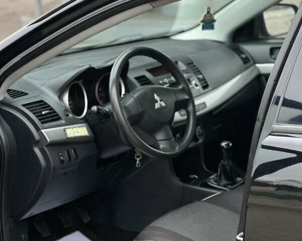 Чорний Міцубісі Lancer, об'ємом двигуна 1.5 л та пробігом 111 тис. км за 6999 $, фото 37 на Automoto.ua