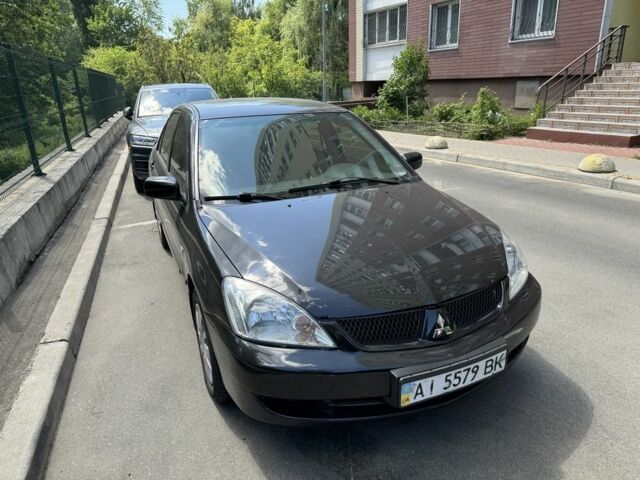 Чорний Міцубісі Lancer, об'ємом двигуна 1.6 л та пробігом 78 тис. км за 3999 $, фото 8 на Automoto.ua