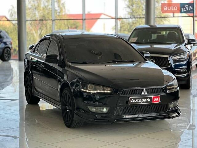 Чорний Міцубісі Lancer, об'ємом двигуна 2 л та пробігом 313 тис. км за 7690 $, фото 2 на Automoto.ua