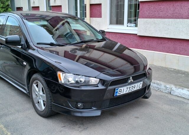 Чорний Міцубісі Lancer, об'ємом двигуна 2 л та пробігом 272 тис. км за 7800 $, фото 2 на Automoto.ua