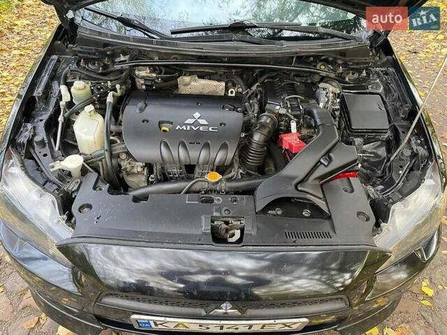 Чорний Міцубісі Lancer, об'ємом двигуна 2 л та пробігом 237 тис. км за 7500 $, фото 18 на Automoto.ua