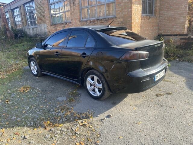 Черный Мицубиси Лансер, объемом двигателя 2 л и пробегом 190 тыс. км за 3100 $, фото 2 на Automoto.ua