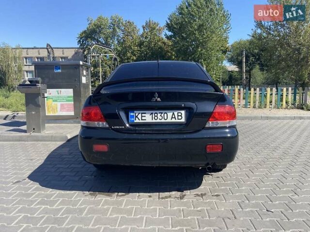 Чорний Міцубісі Lancer, об'ємом двигуна 1.58 л та пробігом 260 тис. км за 4800 $, фото 1 на Automoto.ua
