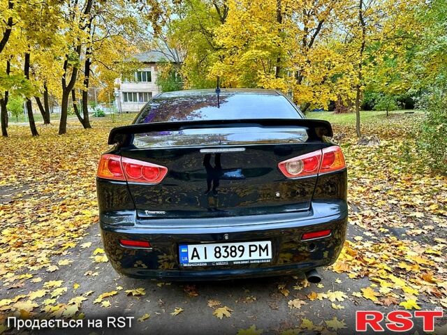 Чорний Міцубісі Lancer, об'ємом двигуна 2 л та пробігом 245 тис. км за 5500 $, фото 5 на Automoto.ua