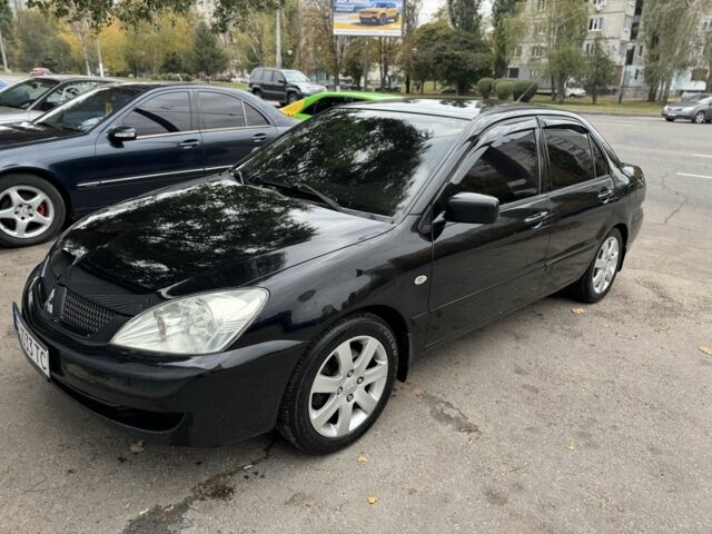 Мицубиси Лансер 2008 в Харькове на Automoto.ua Черный Мицубиси Лансер, объемом двигателя 1.6 л и пробегом 245 тыс. км за 4300 $, фото 1 на Automoto.ua