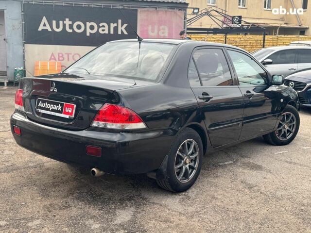 Мицубиси Лансер 2008 в Запорожье на Automoto.ua Черный Мицубиси Лансер, объемом двигателя 1.6 л и пробегом 316 тыс. км за 4290 $, фото 6 на Automoto.ua