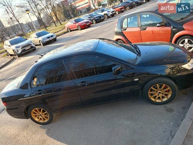 Мицубиси Лансер 2008 в Львове на Automoto.ua Черный Мицубиси Лансер, объемом двигателя 1.58 л и пробегом 200 тыс. км за 5200 $, фото 85 на Automoto.ua