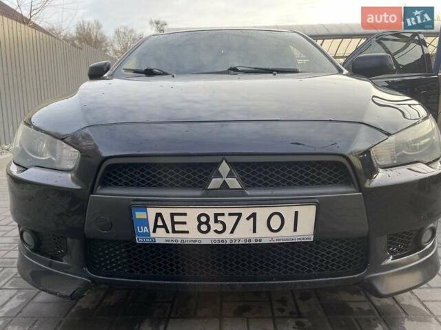 Чорний Міцубісі Lancer, об'ємом двигуна 2 л та пробігом 255 тис. км за 6999 $, фото 1 на Automoto.ua