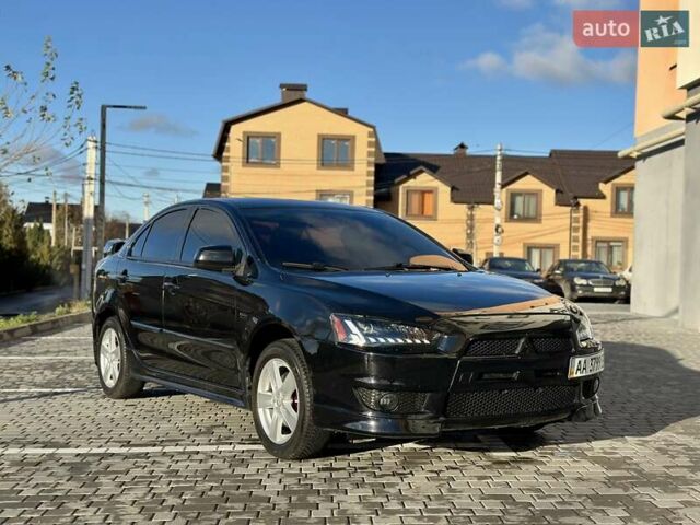 Черный Мицубиси Лансер, объемом двигателя 2 л и пробегом 150 тыс. км за 7850 $, фото 6 на Automoto.ua
