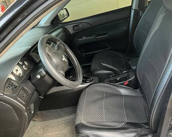 Чорний Міцубісі Lancer, об'ємом двигуна 1.6 л та пробігом 324 тис. км за 3800 $, фото 4 на Automoto.ua