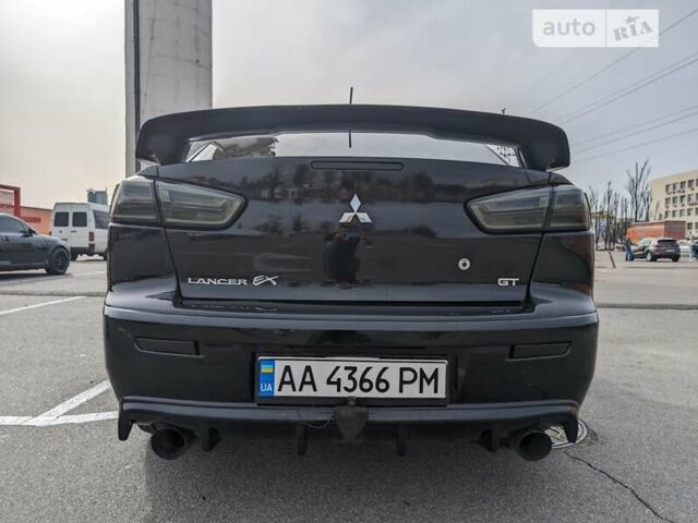 Чорний Міцубісі Lancer, об'ємом двигуна 2 л та пробігом 240 тис. км за 10500 $, фото 8 на Automoto.ua