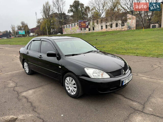 Чорний Міцубісі Lancer, об'ємом двигуна 1.6 л та пробігом 200 тис. км за 4500 $, фото 5 на Automoto.ua