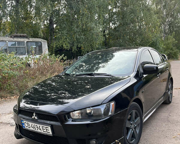 Мицубиси Лансер 2008 в Чернигове на Automoto.ua Черный Мицубиси Лансер, объемом двигателя 2 л и пробегом 254 тыс. км за 7500 $, фото 1 на Automoto.ua