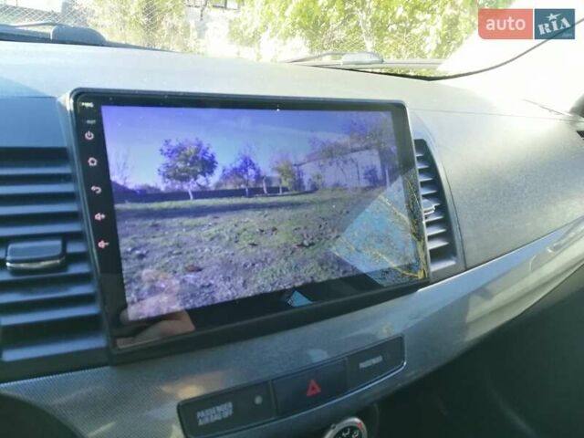 Мицубиси Лансер 2008 в Киеве на Automoto.ua Черный Мицубиси Лансер, объемом двигателя 2 л и пробегом 196 тыс. км за 5500 $, фото 16 на Automoto.ua