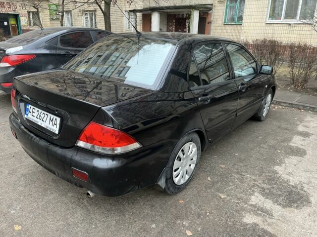 Чорний Міцубісі Lancer, об'ємом двигуна 1.6 л та пробігом 250 тис. км за 3900 $, фото 3 на Automoto.ua