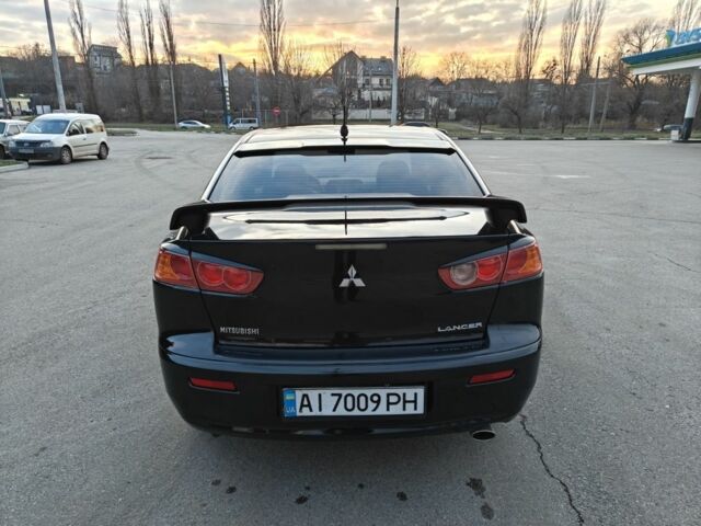 Черный Мицубиси Лансер, объемом двигателя 2 л и пробегом 245 тыс. км за 5600 $, фото 2 на Automoto.ua